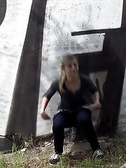 15 pictures - Blonde with pussy piercing pisses outside
