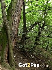 15 pictures - Pretty European is desperate to piss in the woods
