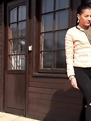 15 pictures - Dark haired babe squats to piss outside
