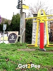 15 pictures - Sexy secretary pisses in a local park