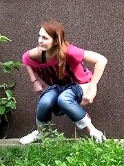 15 pictures - Redhead squats right down to piss