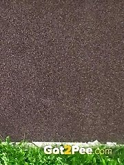 15 pictures - Redhead squats right down to piss