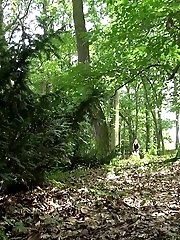 15 pictures - Sexy blonde pees in the forest