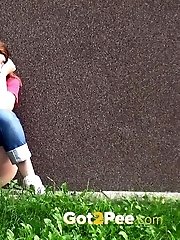 15 pictures - Redhead squats right down to piss