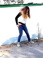 15 pictures - Brunette is all wrapped up while peeing