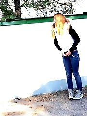 15 pictures - Brunette is all wrapped up while peeing