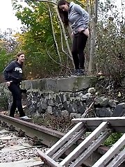 15 pictures - Girlfriends both need to piss while walking outside