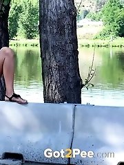 15 pictures - Public pissing for gorgeous dark haired babe