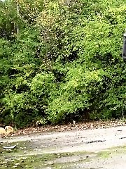 15 pictures - Dark haired babe enjoys a messy piss outside