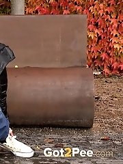 15 pictures - European blonde squats to piss while outside