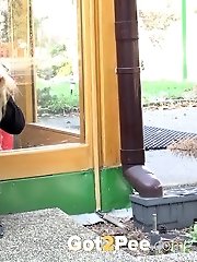 15 pictures - European girl pisses outside a summer house