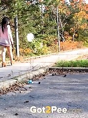 15 pictures - Closeup outdoor pissing for gorgeous hottie