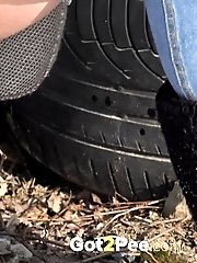 15 pictures - Dark haired babe squats to piss in the snow