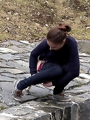 15 pictures - Antonia pees outside next to drainage pipe
