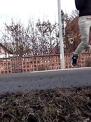 15 pictures - Brunette girl needs to pee while walking by a road