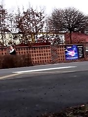 15 pictures - Brunette girl needs to pee while walking by a road