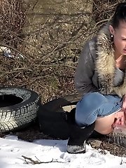15 pictures - Dark haired babe squats to piss in the snow