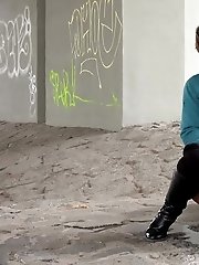 15 pictures - Cute girl in boots pisses outside in the city