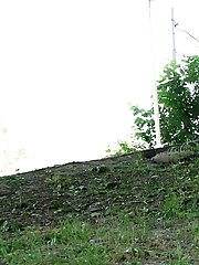 15 pictures - Blonde babe squats and pisses outside near a wall