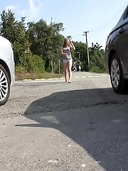 15 pictures - Cute European girl squats and pees over the ground