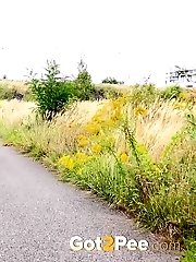 15 pictures - Cute European squatting to pee on a path