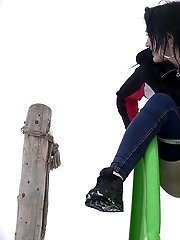 15 pictures - Public pissing for dark haired babe in the park