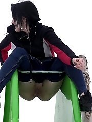 15 pictures - Public pissing for dark haired babe in the park