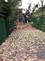 15 pictures - Gorgeous raven haired girl pisses on wooden path