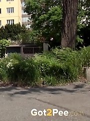 15 pictures - Pretty teen pees in public on busy road