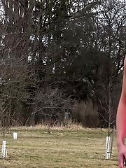 15 pictures - Claudia Macc pisses in public outside in field