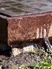 15 pictures - Redhead sprays a messy stream of piss outside