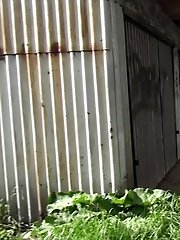 15 pictures - Cute brunette leaves a puddle of piss in the soil