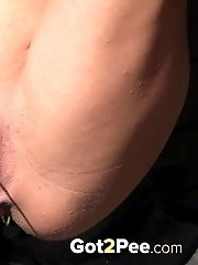 15 pictures - Outdoor pissing for pretty babe who pees in a well