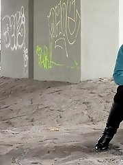 15 pictures - Cute girl in boots pisses outside in the city