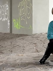 15 pictures - Cute girl in boots pisses outside in the city