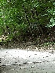 15 pictures - Bare ass is on show as a dark haired babe pees