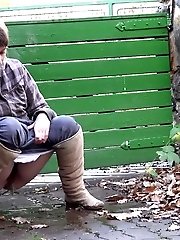 15 pictures - Sexy girl squats on a path and pisses outside
