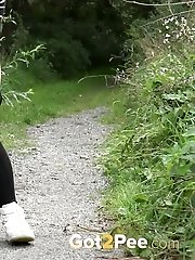 15 pictures - Cute European squatting to pee on a path