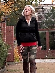 15 pictures - Pretty blonde pisses on the ground outside