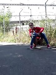 15 pictures - European in glasses squats to piss by railway