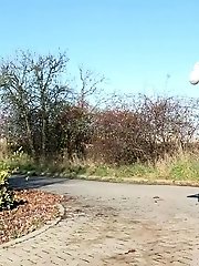 15 pictures - Sun glistens on a hot blonde as she pees
