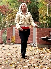 15 pictures - Blonde babe squats to piss on fallen leaves