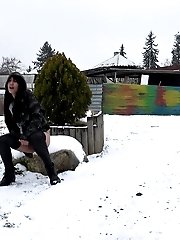 15 pictures - Stunning dark haired girl pisses out in the snow