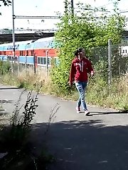 15 pictures - European in glasses squats to piss by railway