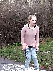 15 pictures - Cute blonde pisses onto snow to melt it