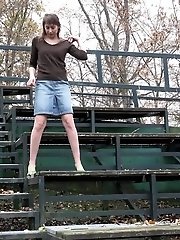 15 pictures - Sexy brunette sprays her piss outside