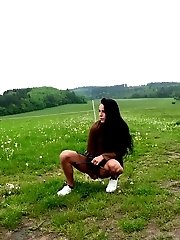15 pictures - Lexi Dona pisses in the middle of a field