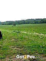 15 pictures - Lexi Dona pisses in the middle of a field