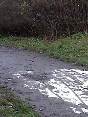 15 pictures - Cute blonde pisses onto snow to melt it