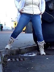 15 pictures - Two girlfriends piss in public next to bus stop